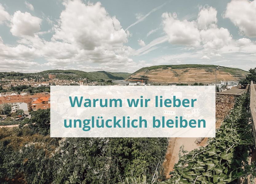 Blick über Weinheim das Titelbild für den Beitrag "Warum wir lieber unglücklich bleiben, anstatt etwas zu verändern"